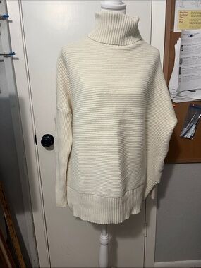 Classic Cream Ribbed Turtleneck Sweater